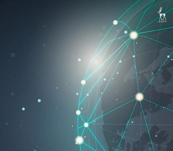 One side of a dark, navy globe with glowing lights representing cities. Bright turquoise lines arc between the cities to illustrate a global network.