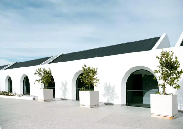 The Hazendal Hotel, showcasing multiple arched floor-to-ceiling windows.