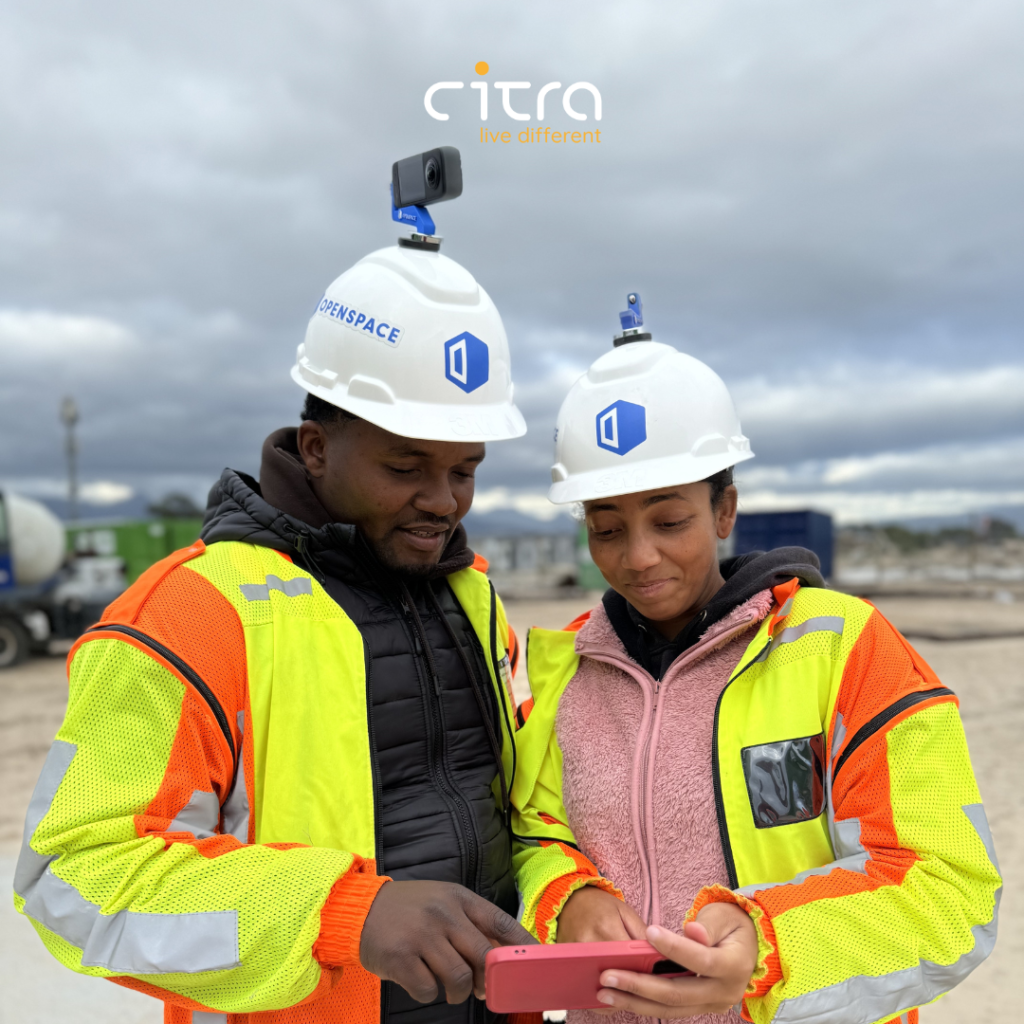 Citra Site Manager and site administrator looking at the Open Space App on a mobile phone, on site.