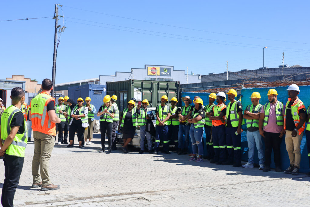 The Citra team gathered outside the new laboratory facility, listening to an opening address during the official launch event.