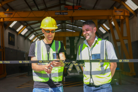The Chairman and CEO of Citra stand together, cutting a branded Citra ribbon to officially inaugurate the new Citra Laboratory facility.