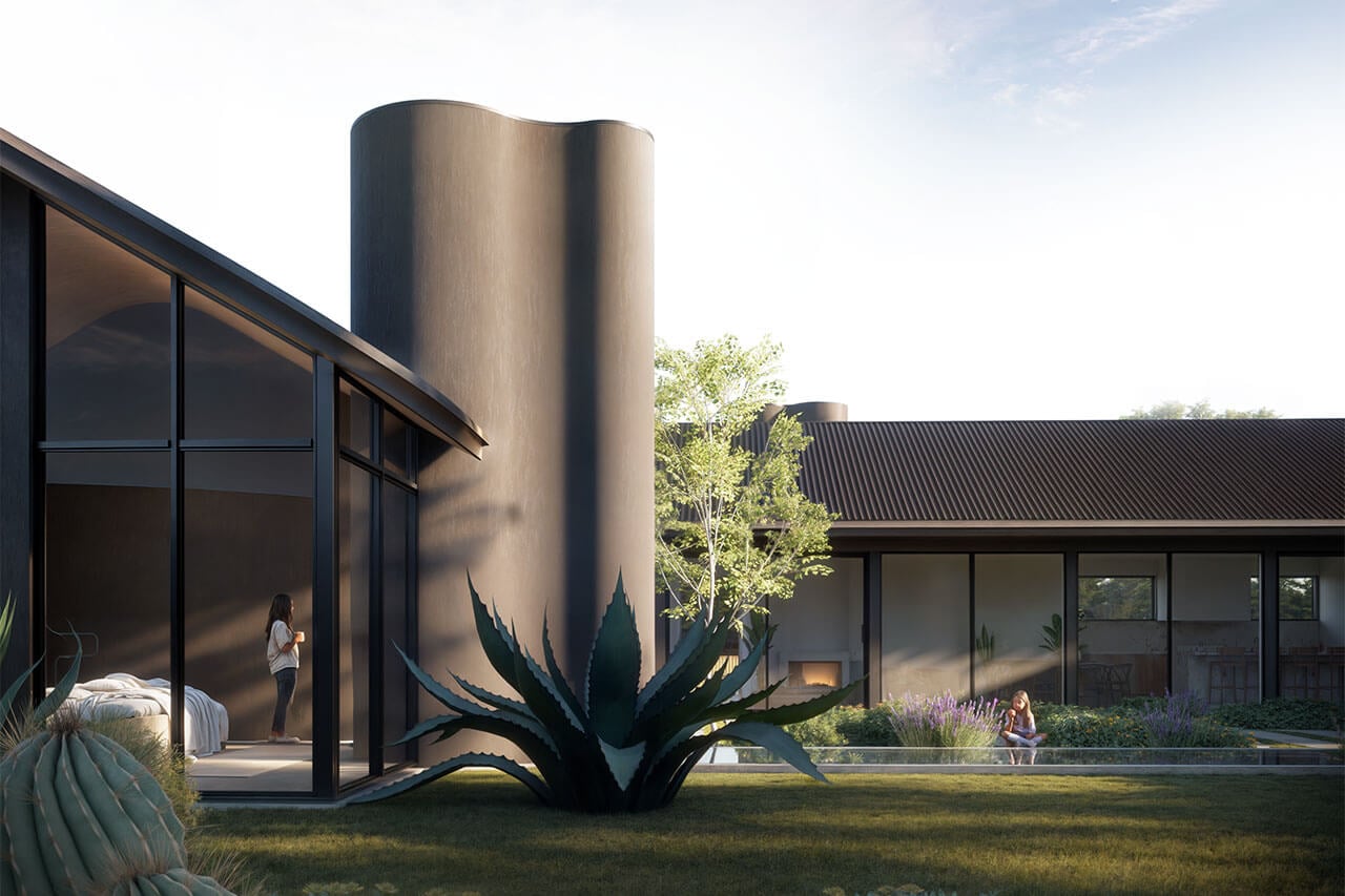 Contemporary architectural design of Citra building with glass walls and lush landscaping.